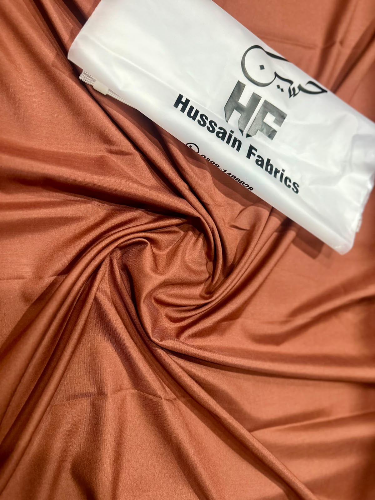 Hussain Fabrics Premium Italian Boski – Copper Clay Unstitched Suit for Men